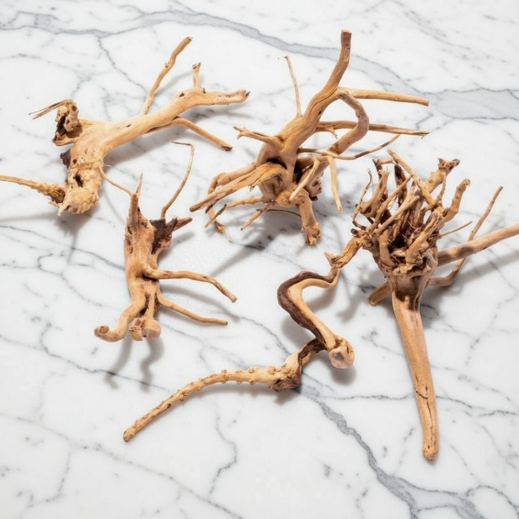 Driftwood pieces on a marble surface