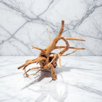 Driftwood on a marble surface