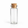 A small clear glass bottle with a round cork stopper, shown on a clean white background.