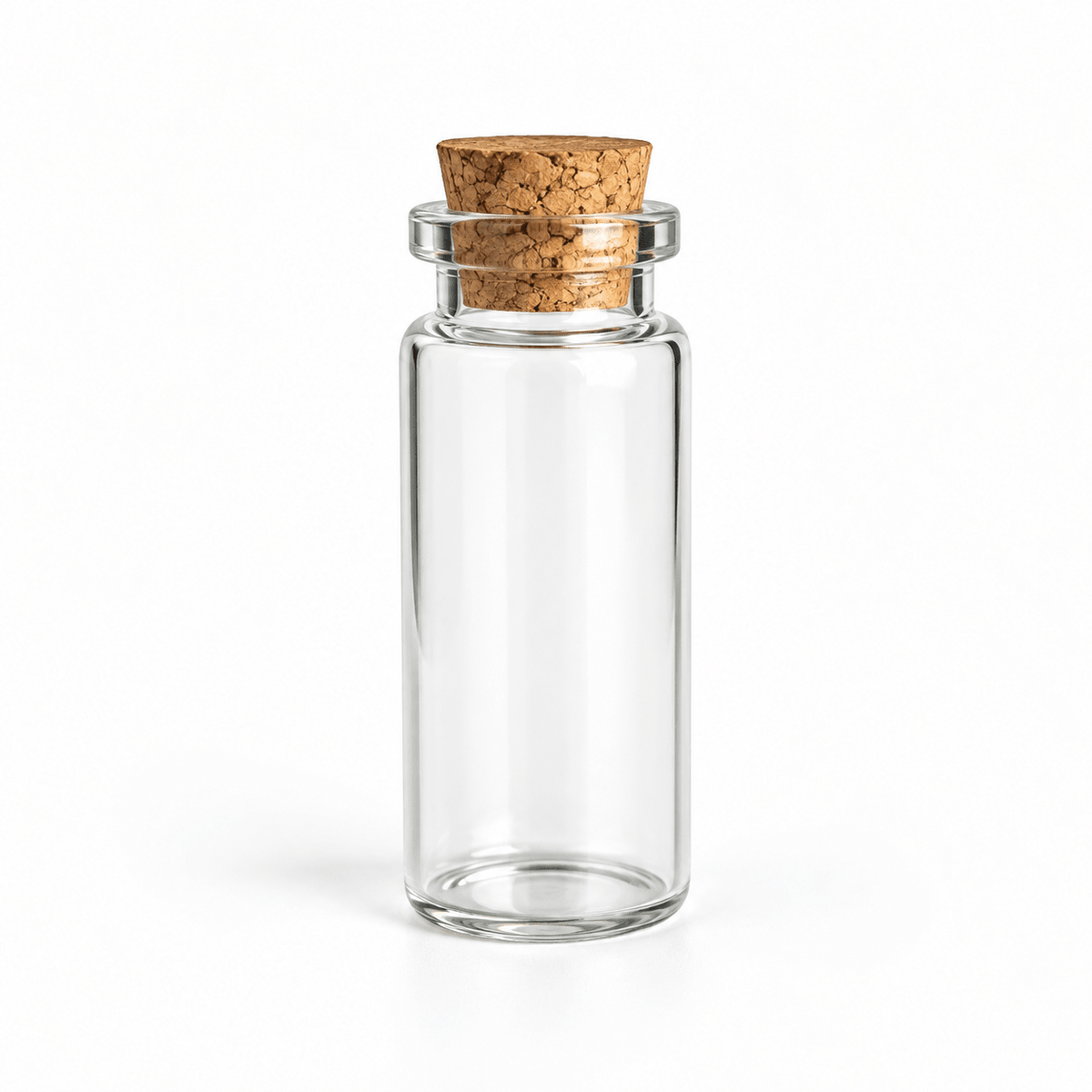 A small clear glass bottle with a round cork stopper, shown on a clean white background.