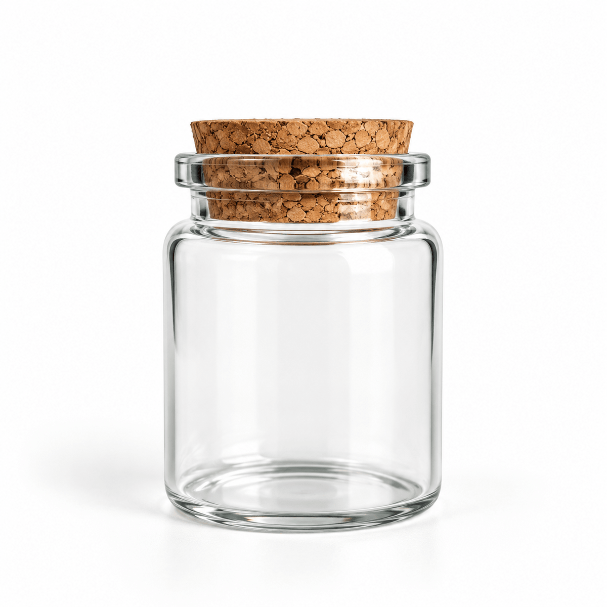 A clear glass jar with a cork stopper, photographed on a clean white background.