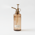 Glass spray bottle for gentle misting of terrariums and plants. Designed for controlled moisture and calm care routines.