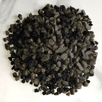 Basalt pebbles on a marble surface for terrariums