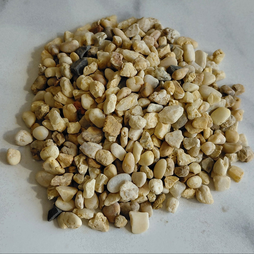 Small stones on a marble surface