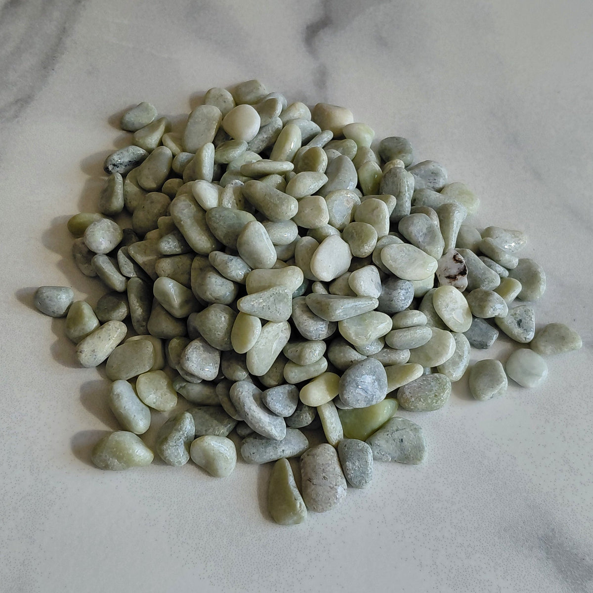 Small stones on a marble surface