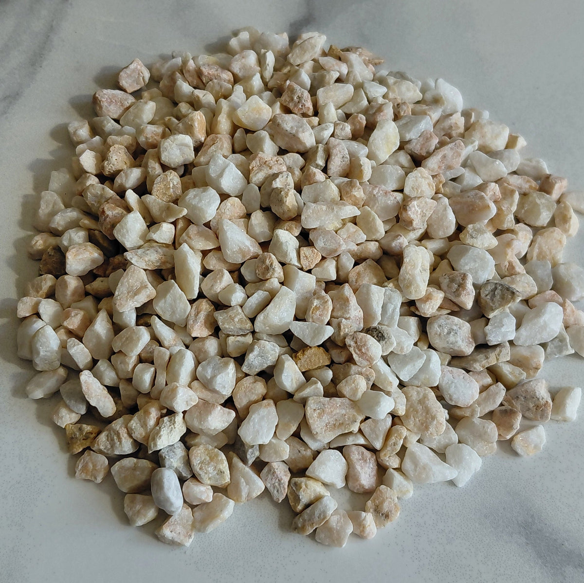 Small stones on a marble surface