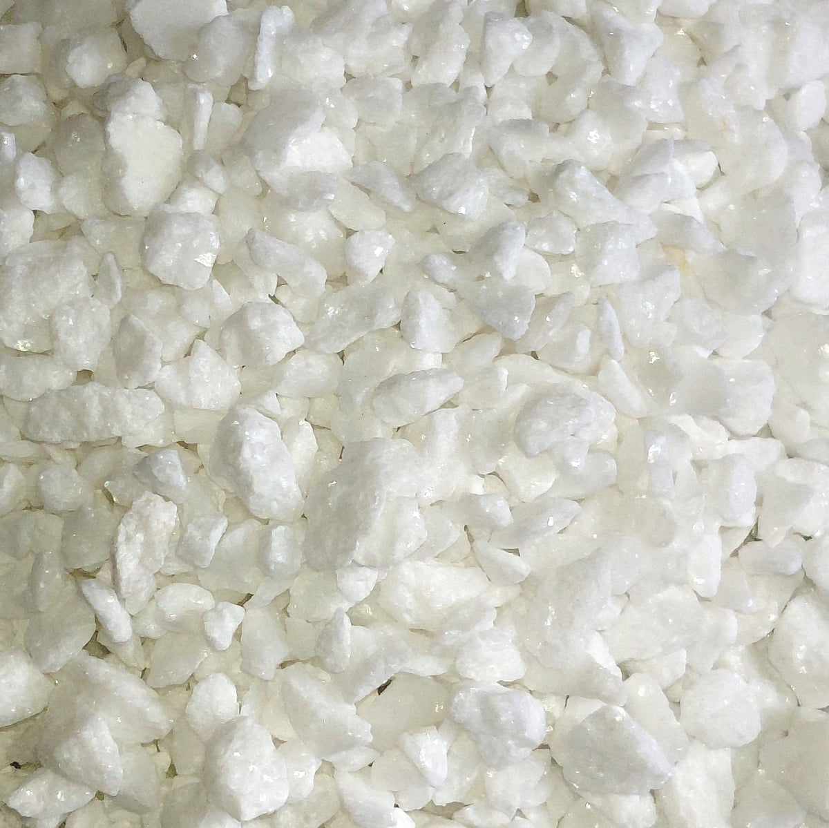 Close-up of white crushed stones or crystals for terrariums